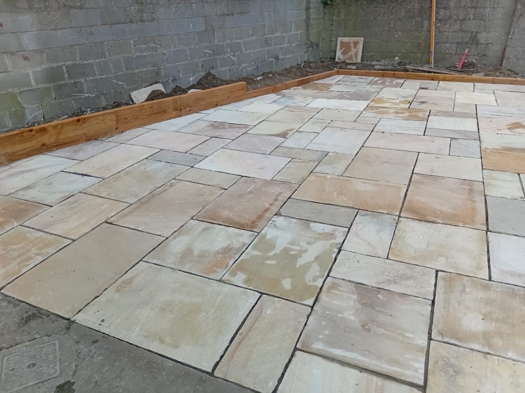 Indian sandstone patio and railway sleepers 3