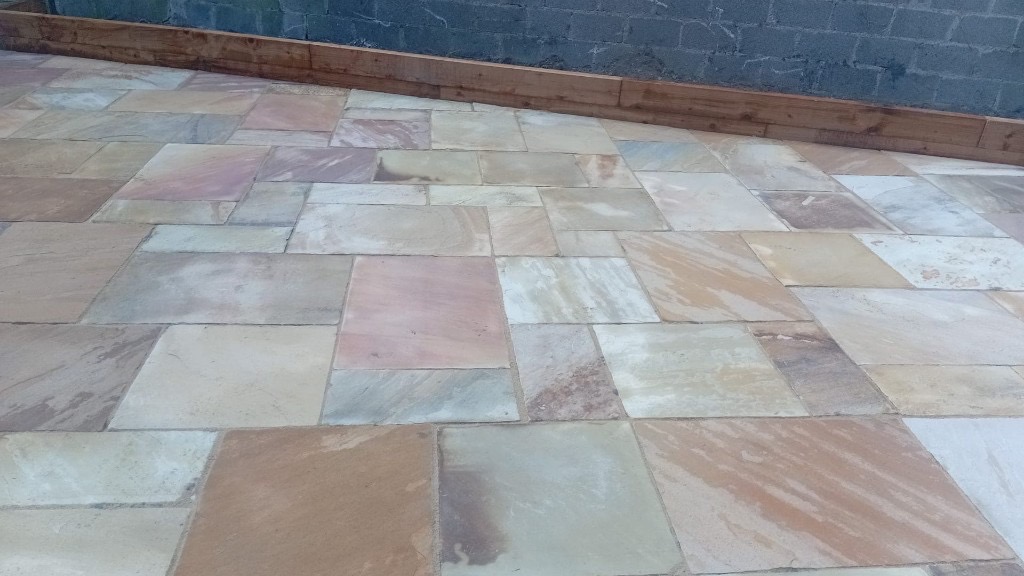 Indian sandstone patio and railway sleepers 7