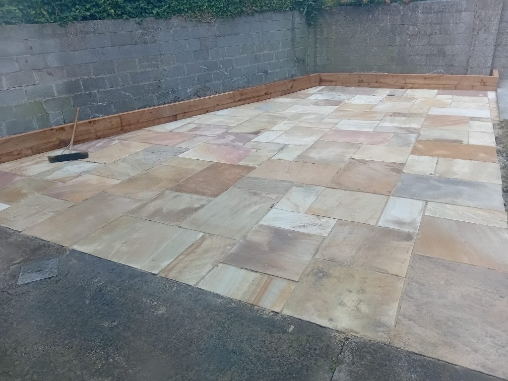 Indian sandstone patio and railway sleepers 8