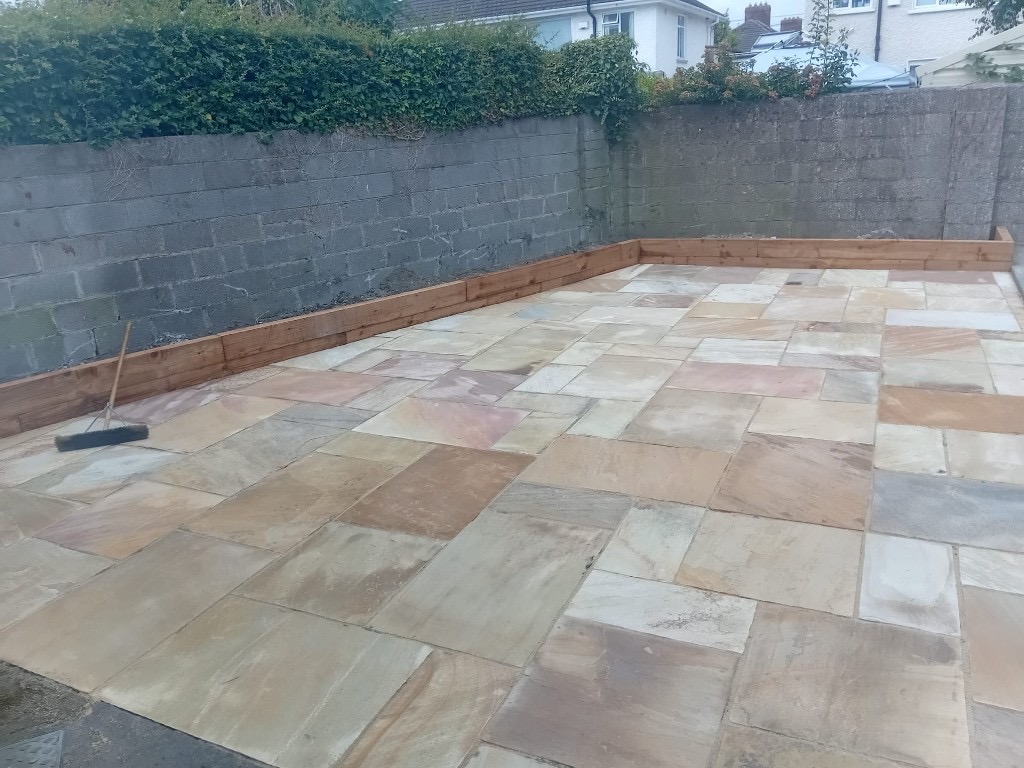 Indian sandstone patio and railway sleepers 9