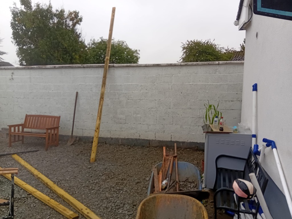 patio, artificial grass, flower beds and wooden slatting